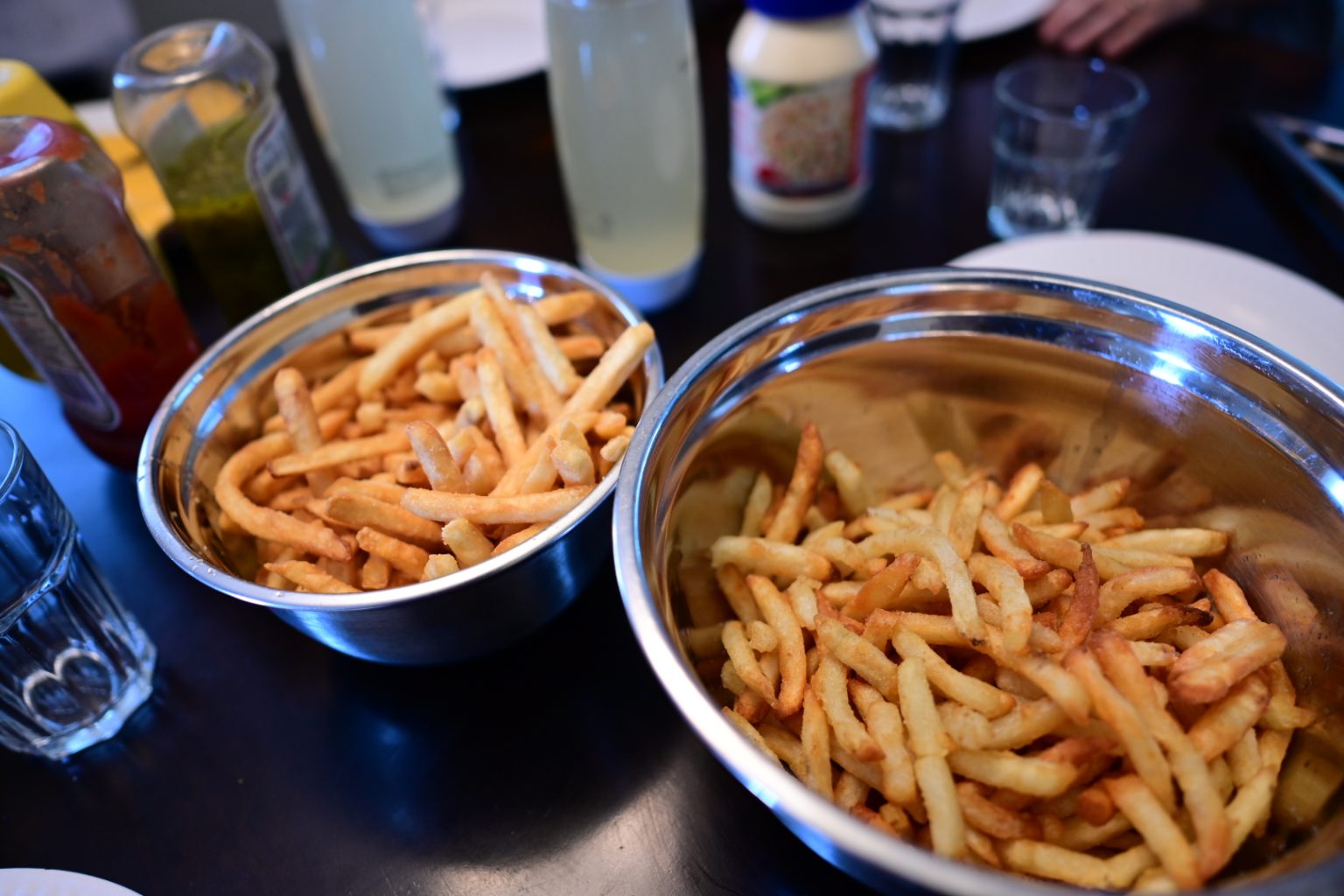 Fries from a deep fryer and air fryer